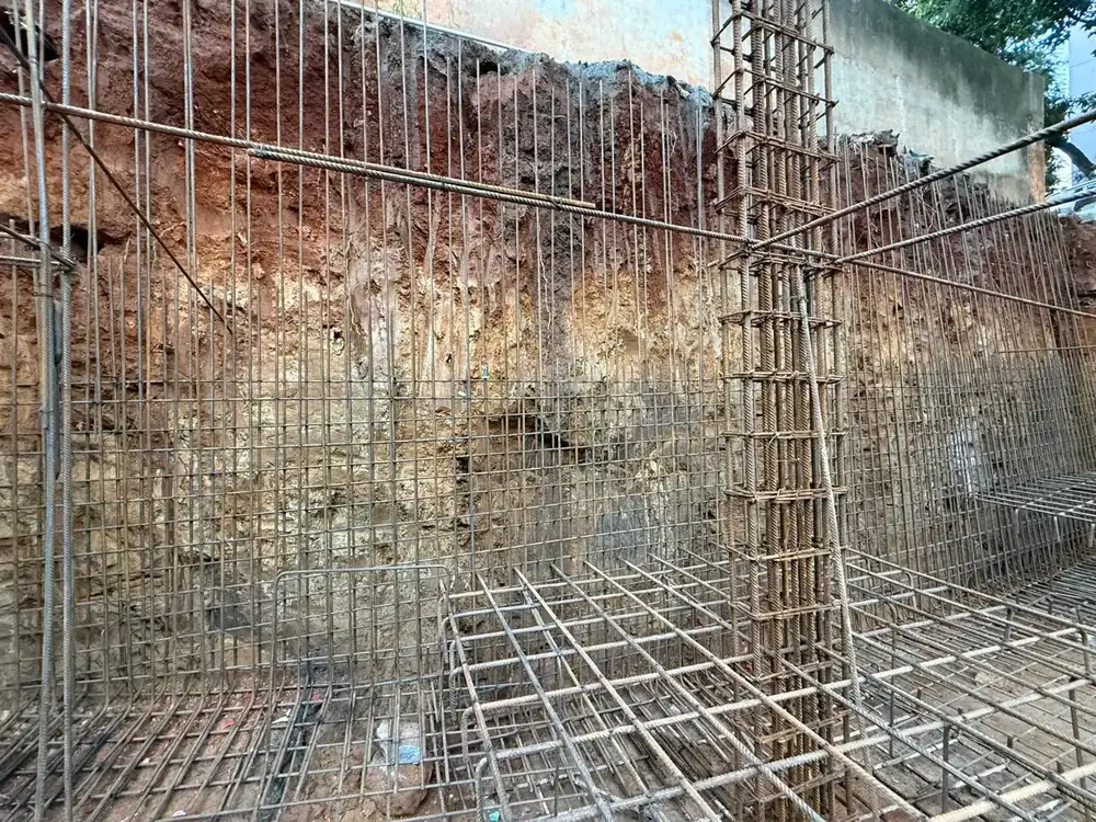 Foundation reinforcement — rebar cage in the basement excavation